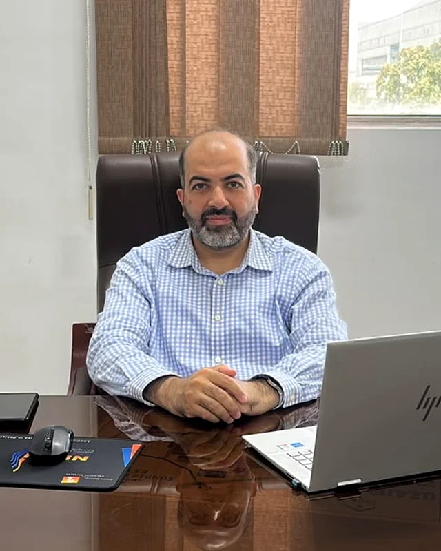 Ahmad Umair, Chief Executive Officer of TN Pharmaceuticals, at his desk